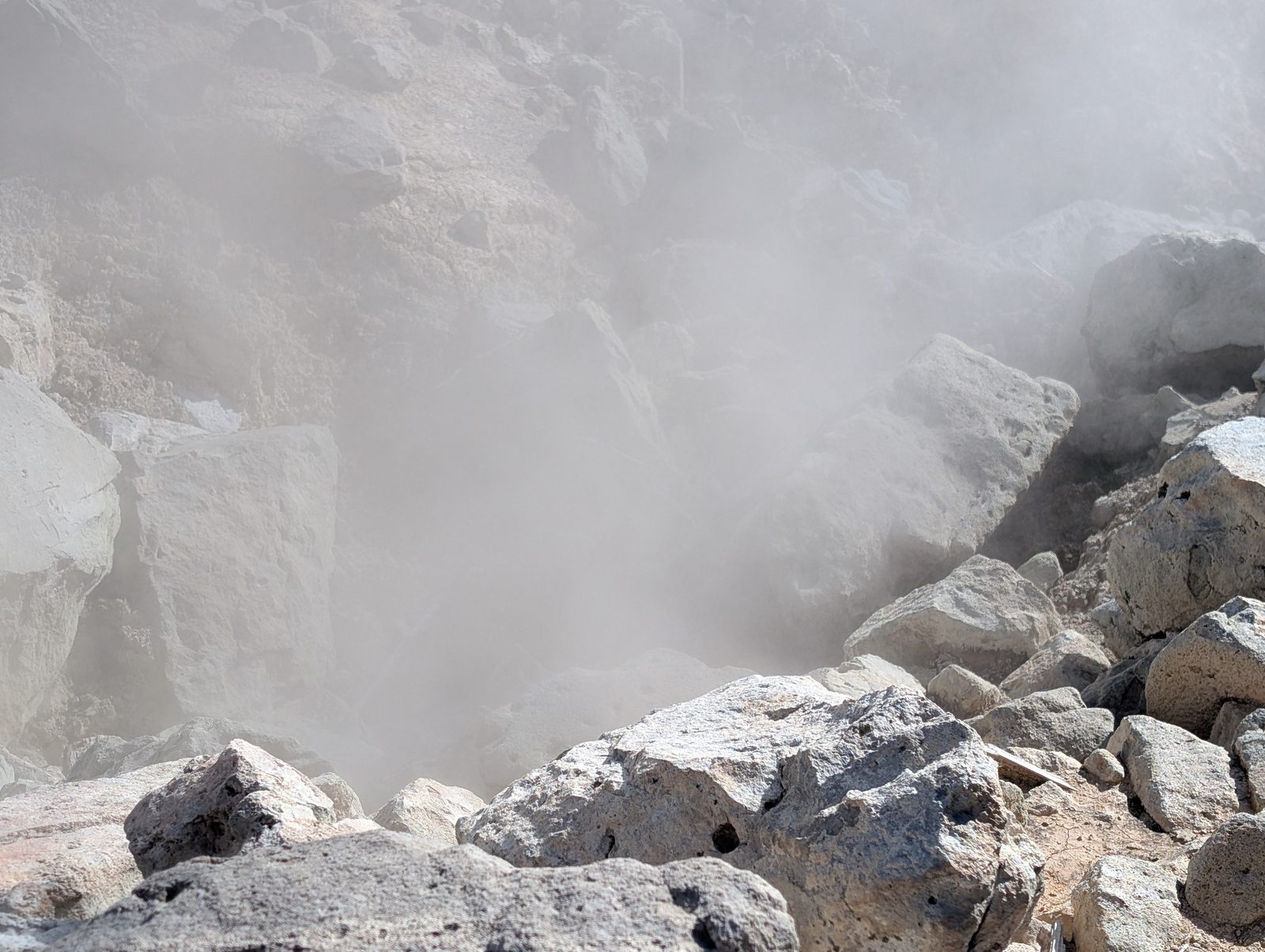 Dense steam obscuring the rocky terrain at Bumpass Hell