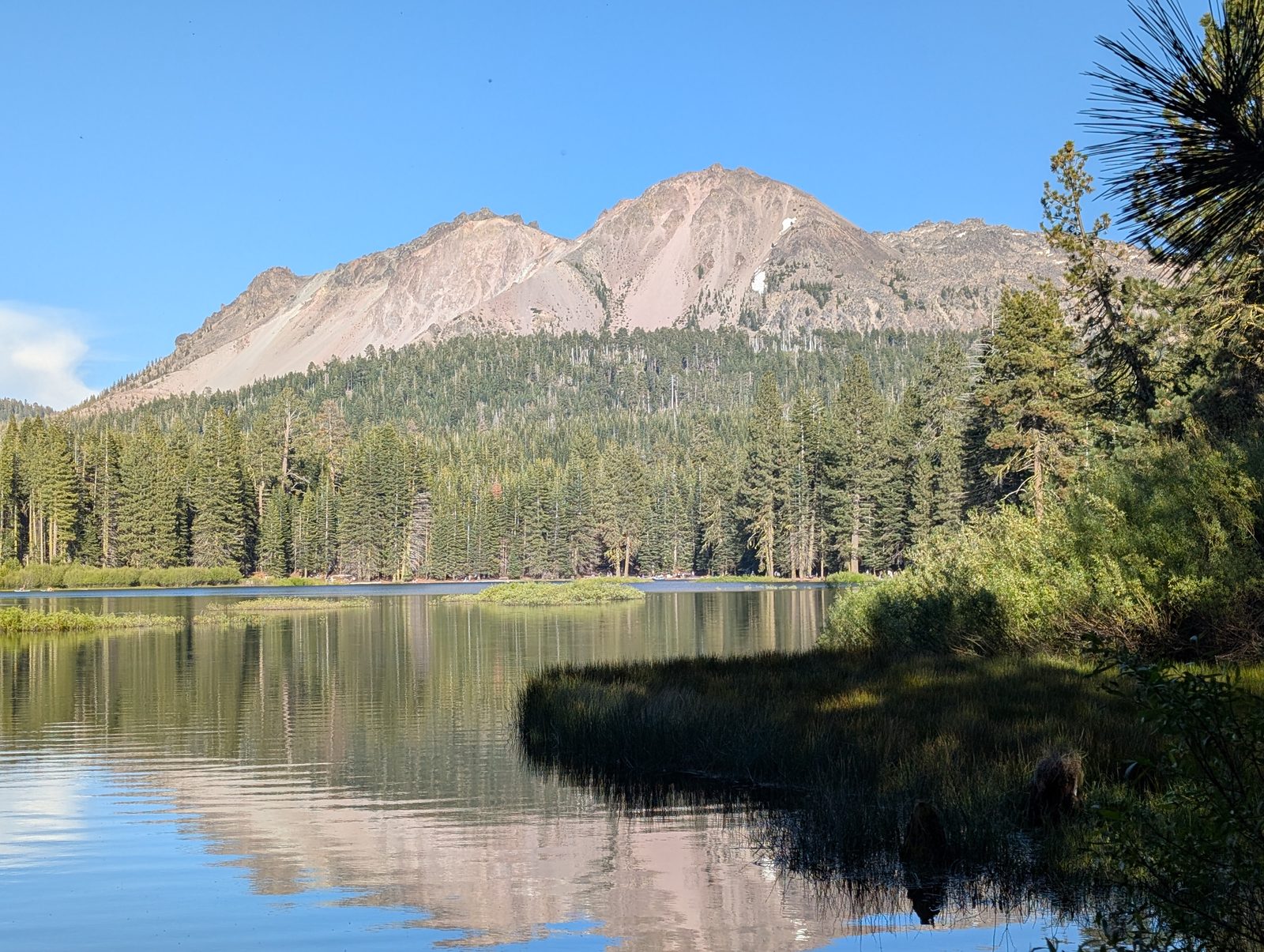 Lassen Peak reflected in the still waters of Manzanita Lake