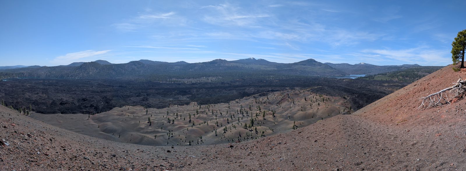 Panoramic view of the Painted Dunes and surrounding lava fields from the Cinder Cone rim